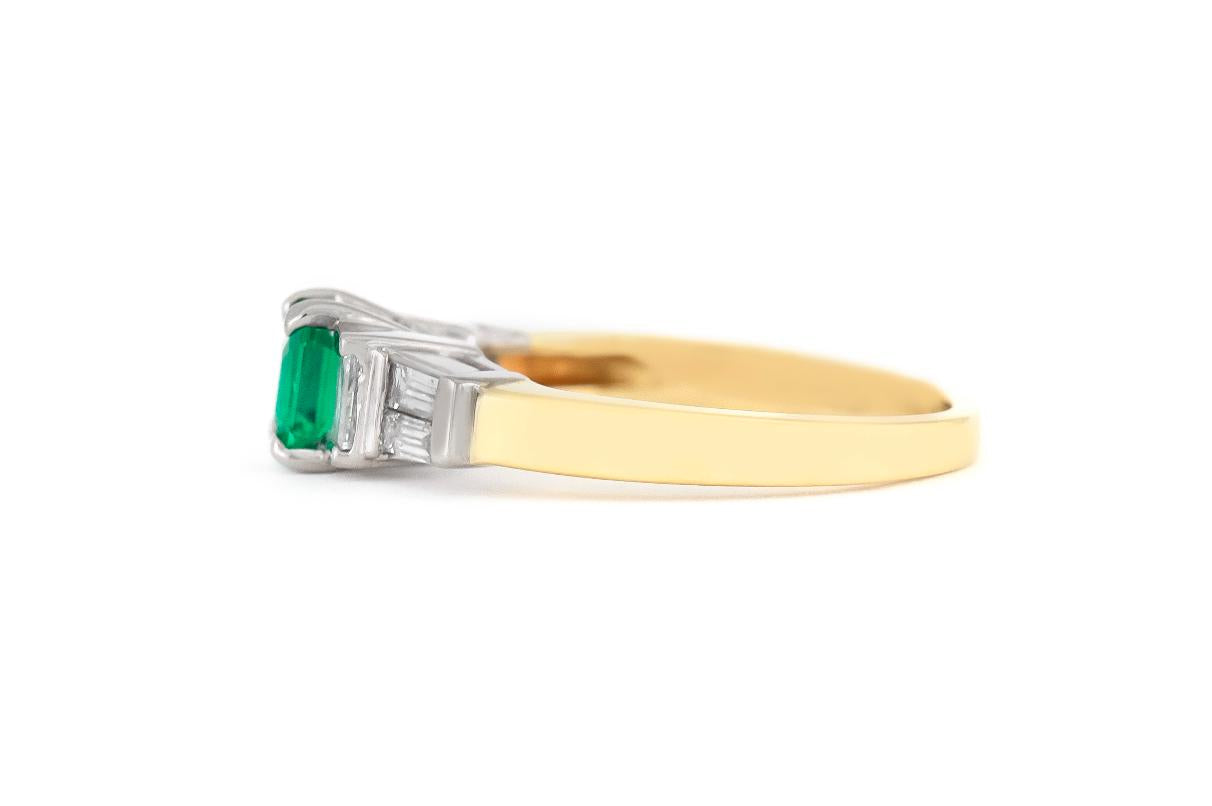 Vintage 1950s 0.60 Carat Emerald Cut Emerald Ring with Diamonds