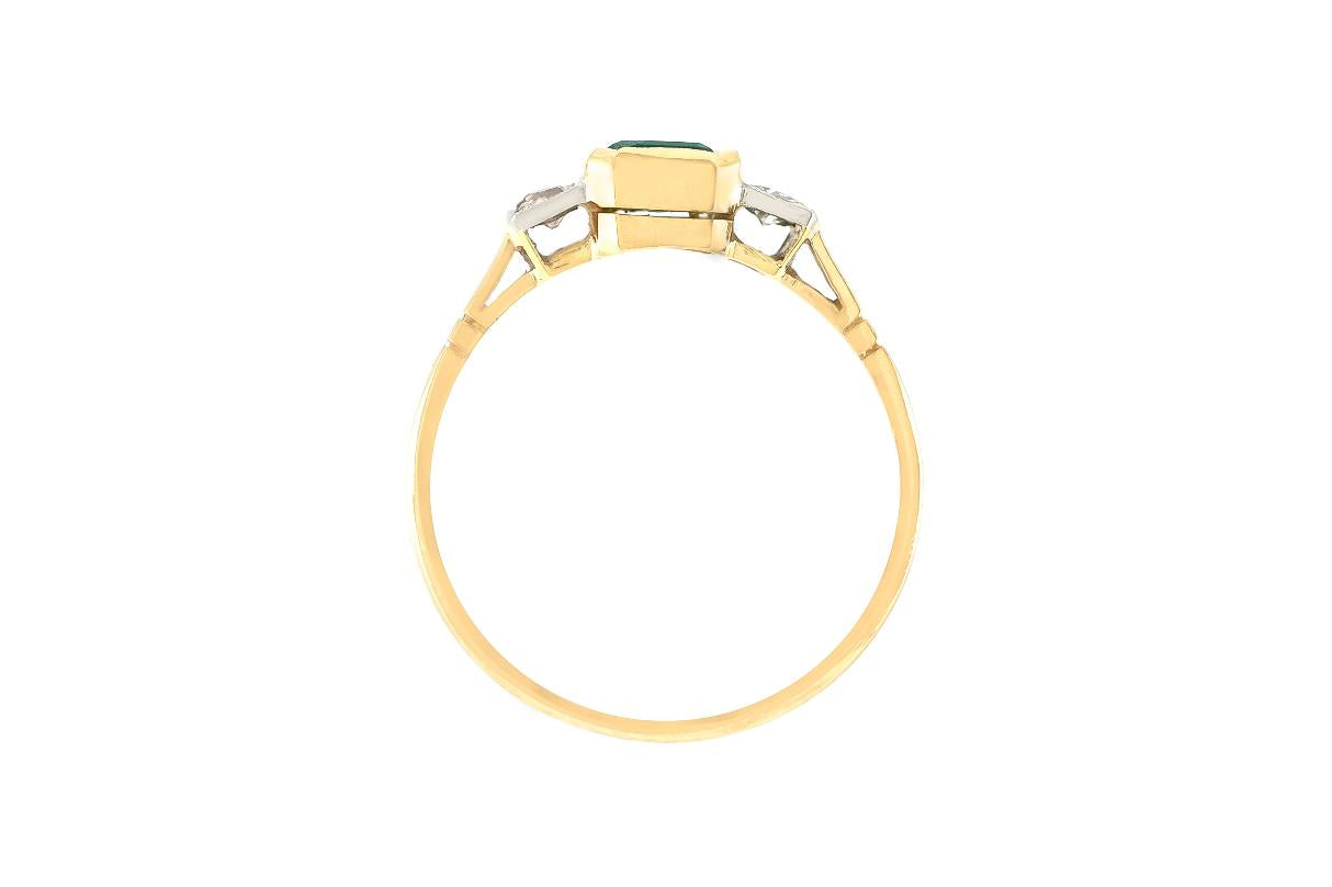 Vintage 1950s 0.60 Carat Emerald Cut Emerald Ring with Diamonds