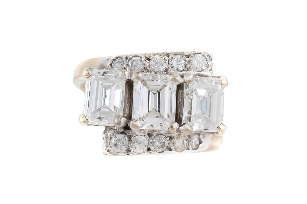 Vintage 1950s Three Stone 3.00 Carat Emerald Cut Diamond Ring