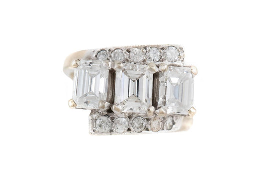Vintage 1950s Three Stone 3.00 Carat Emerald Cut Diamond Ring