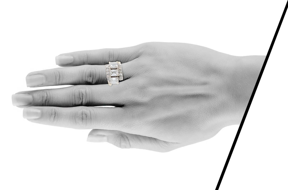 Vintage 1950s Three Stone 3.00 Carat Emerald Cut Diamond Ring