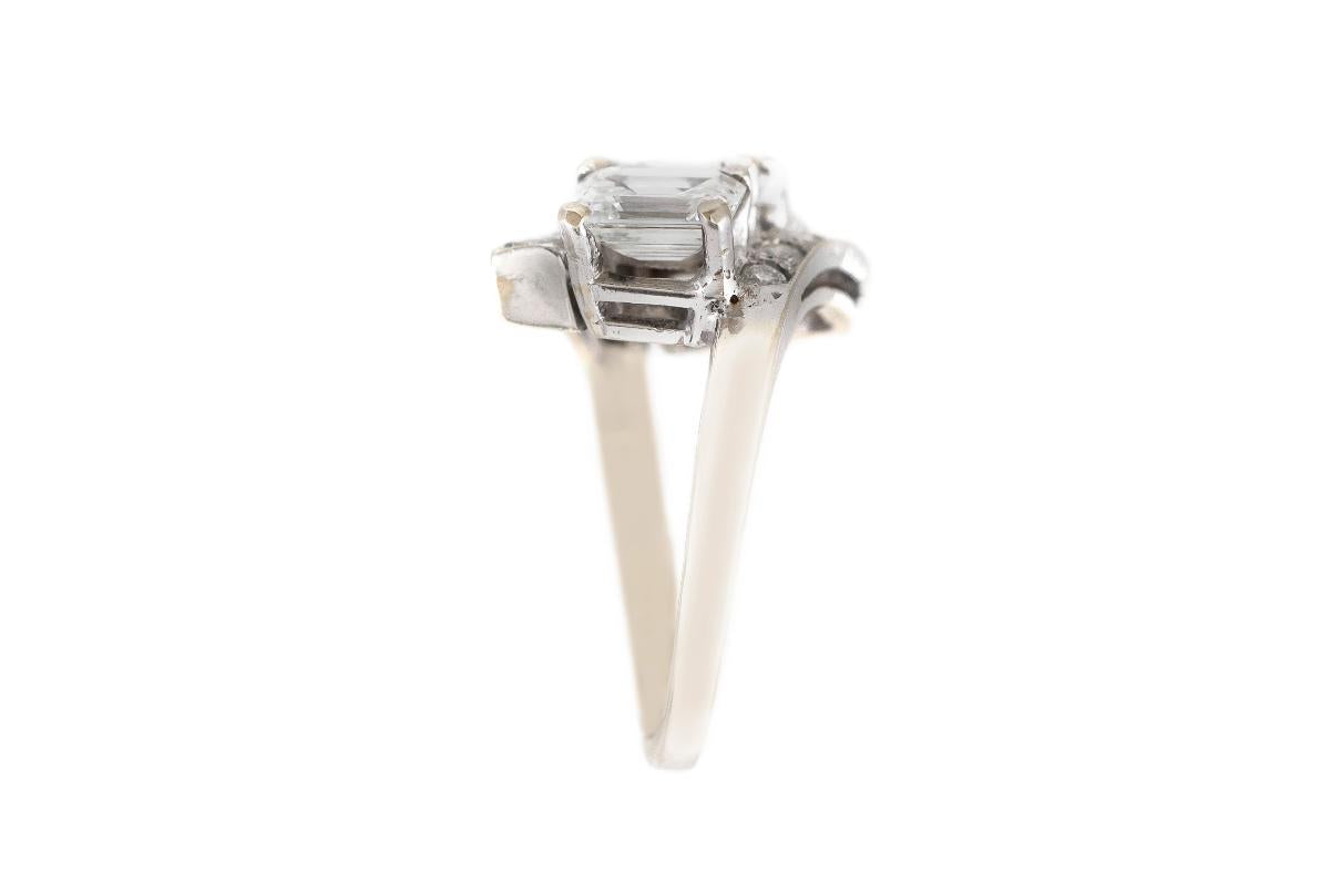 Vintage 1950s Three Stone 3.00 Carat Emerald Cut Diamond Ring