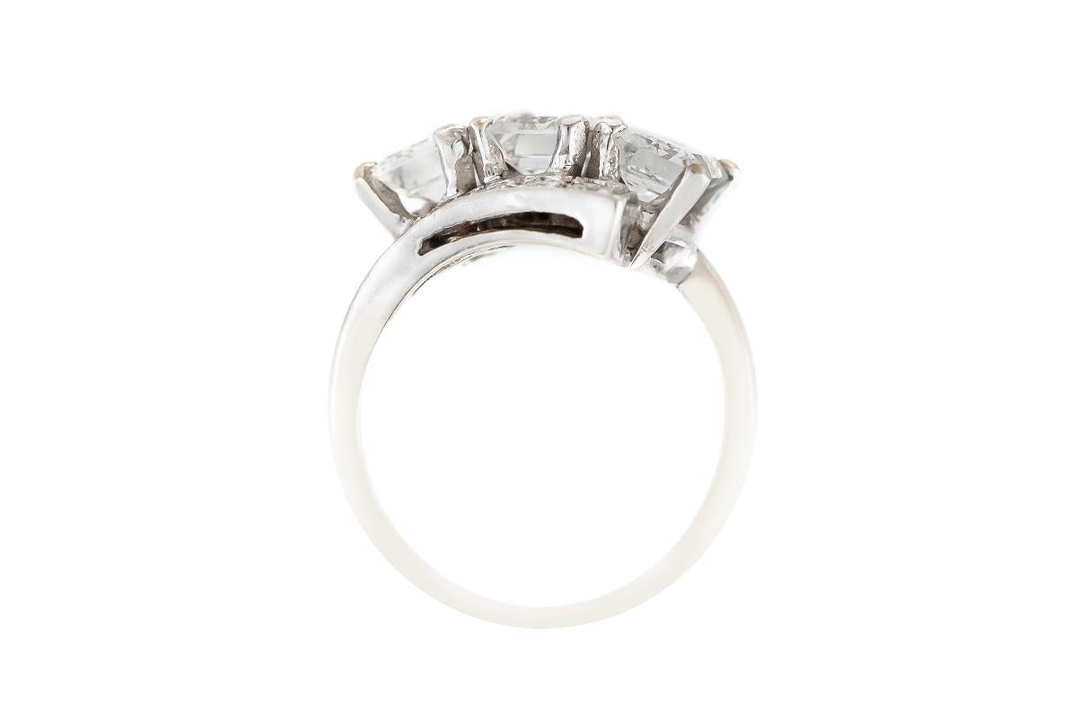 Vintage 1950s Three Stone 3.00 Carat Emerald Cut Diamond Ring