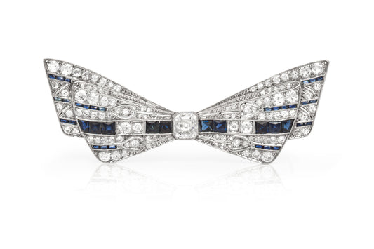 Antique Art Deco 1920s 2.70 Carat Diamond Bow Brooch with Sapphires