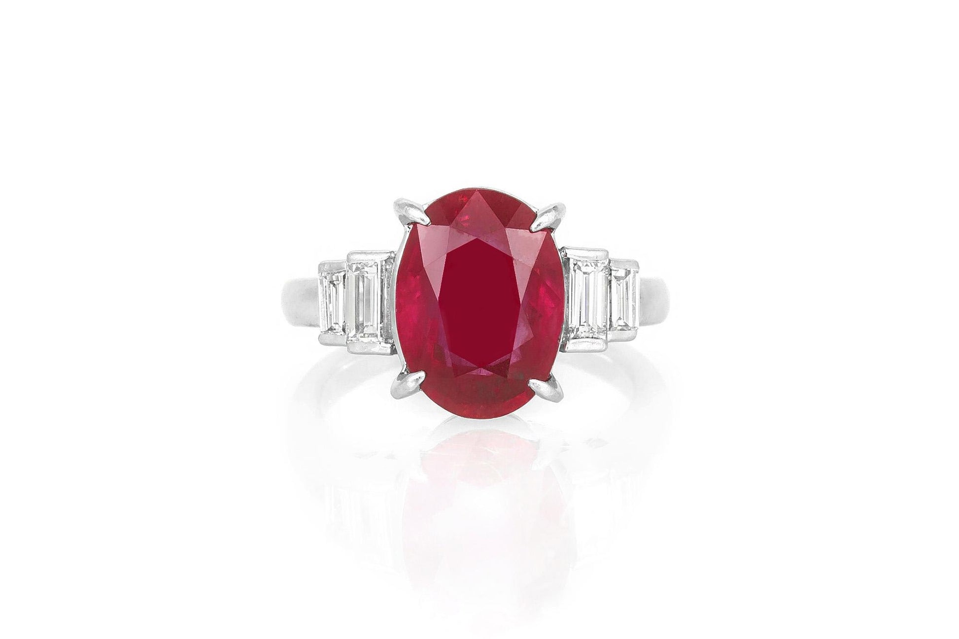 Vintage 1950s 5.39 Carat Oval Cut Ruby and 0.50 Carat Diamonds Ring