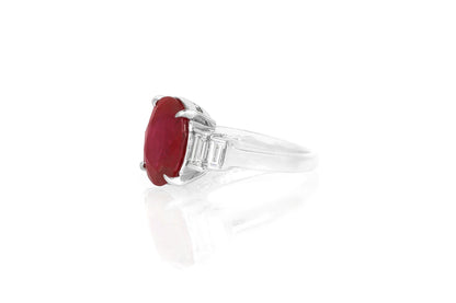 Vintage 1950s 5.39 Carat Oval Cut Ruby and 0.50 Carat Diamonds Ring