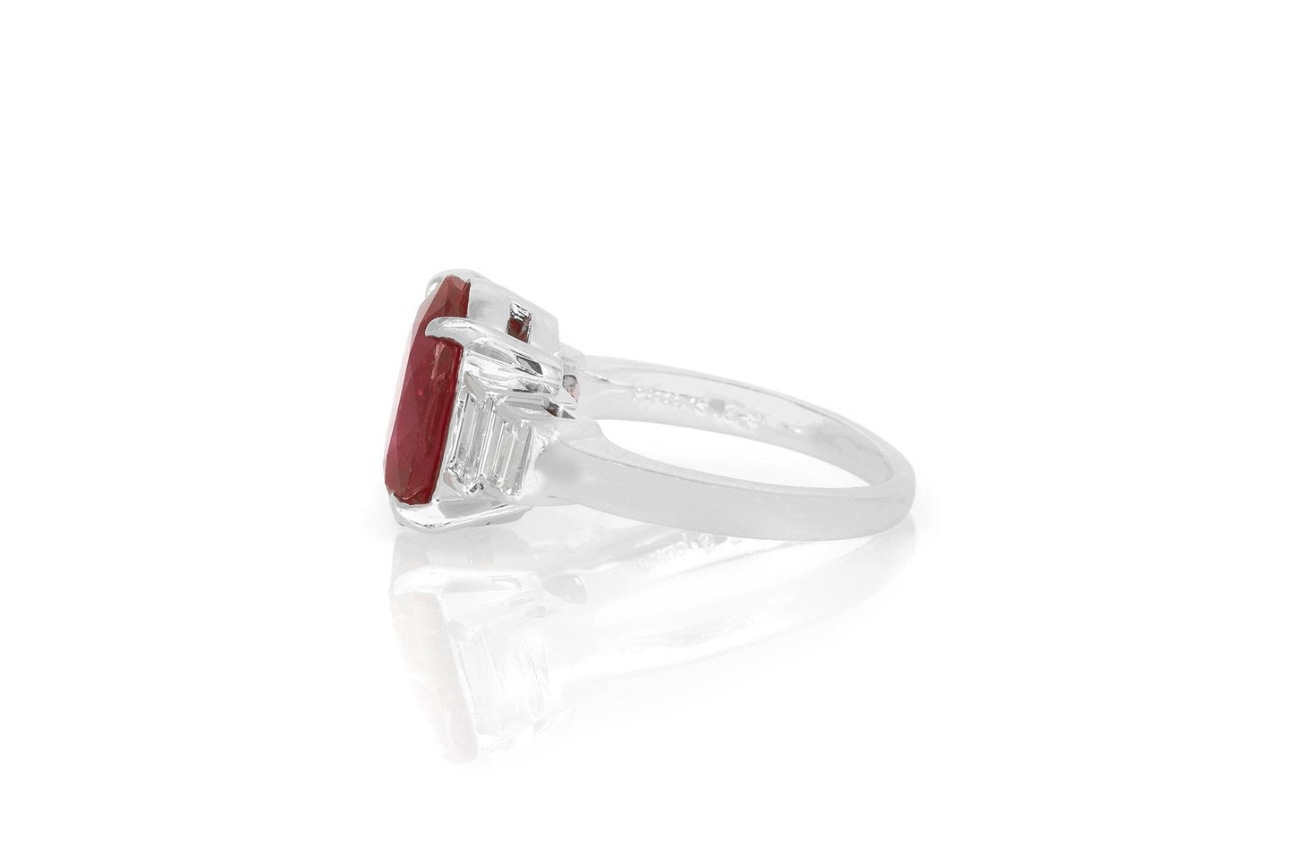 Vintage 1950s 5.39 Carat Oval Cut Ruby and 0.50 Carat Diamonds Ring