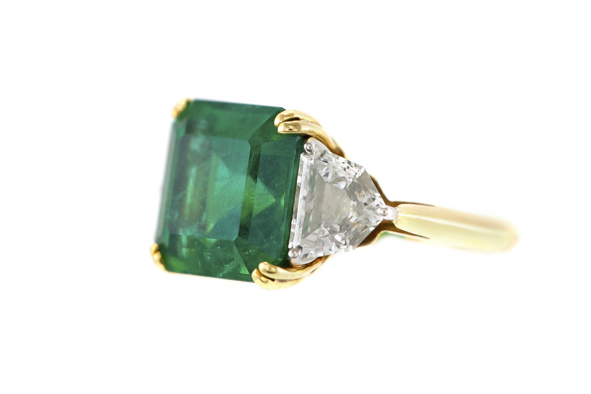 7.60 Carat Emerald and 1.30 Carat Shield cut Diamonds Ring