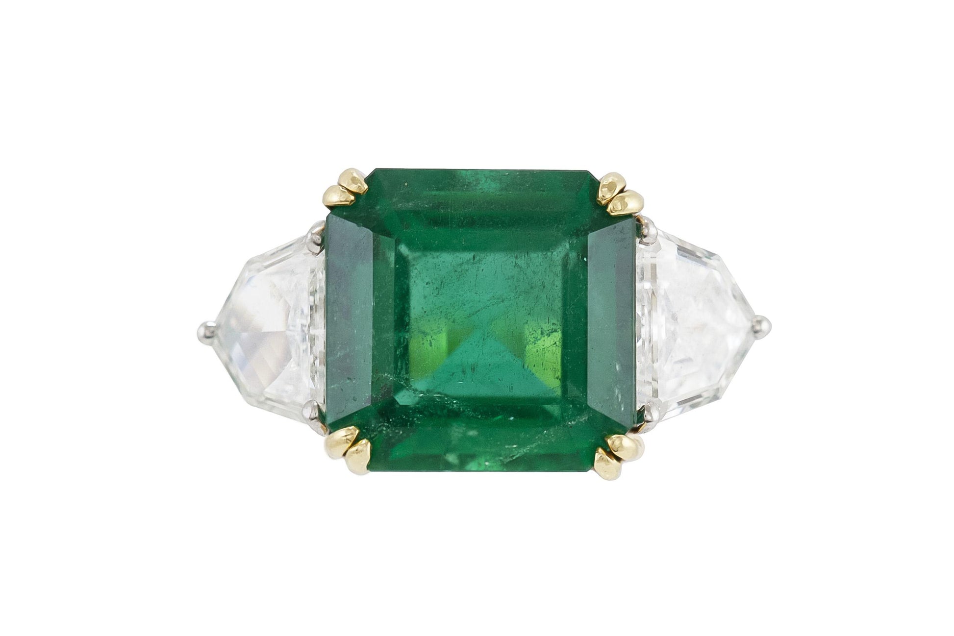 7.60 Carat Emerald and 1.30 Carat Shield cut Diamonds Ring