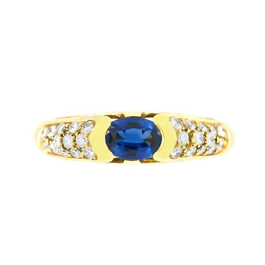 Vintage 1980s 0.70 Carat Oval Cut Sapphire Ring with Diamonds