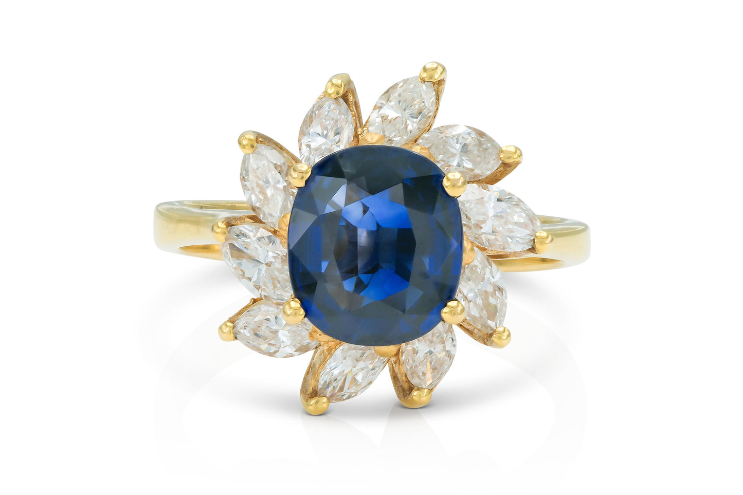 Vintage 1980s 2.54 Carat Oval Cut Sapphire and 1.16 Carat Marquise Diamonds Ring