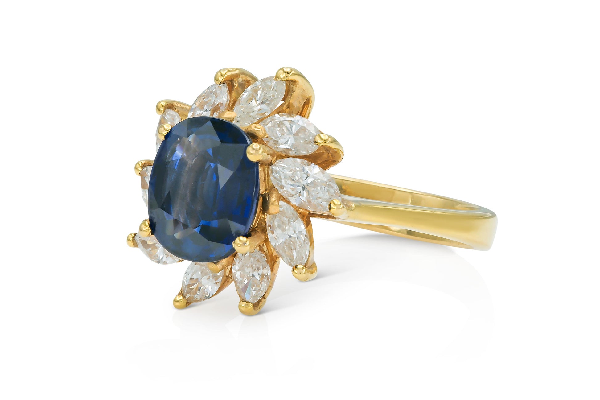 Vintage 1980s 2.54 Carat Oval Cut Sapphire and 1.16 Carat Marquise Diamonds Ring