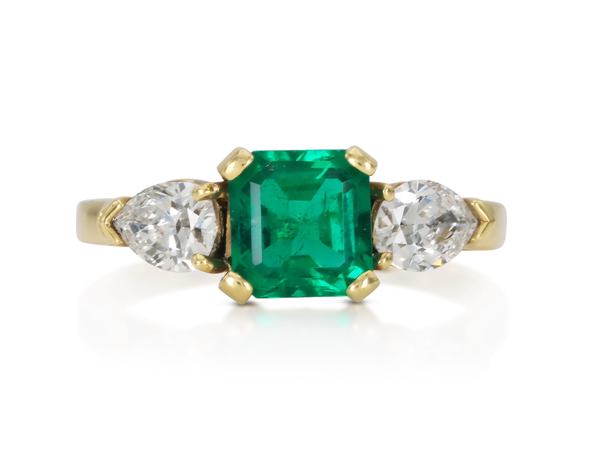 1.06 Carat Emerald cut Ring With Pear Shaped Diamonds