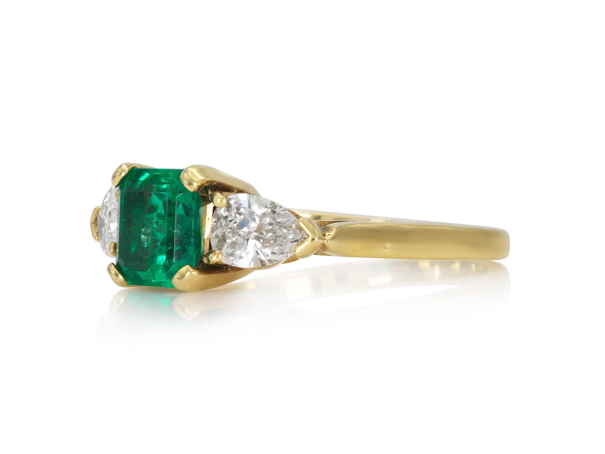 1.06 Carat Emerald cut Ring With Pear Shaped Diamonds