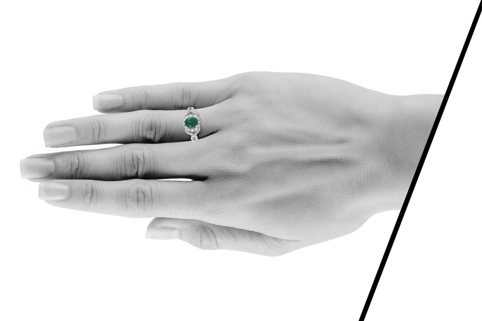 1.07 Carat Oval Cut Emerald Ring with Diamonds