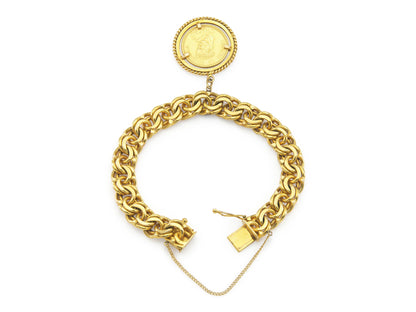 Gold link bracelet with Venezuelan Chacao coin charm and safety chain, open clasp view