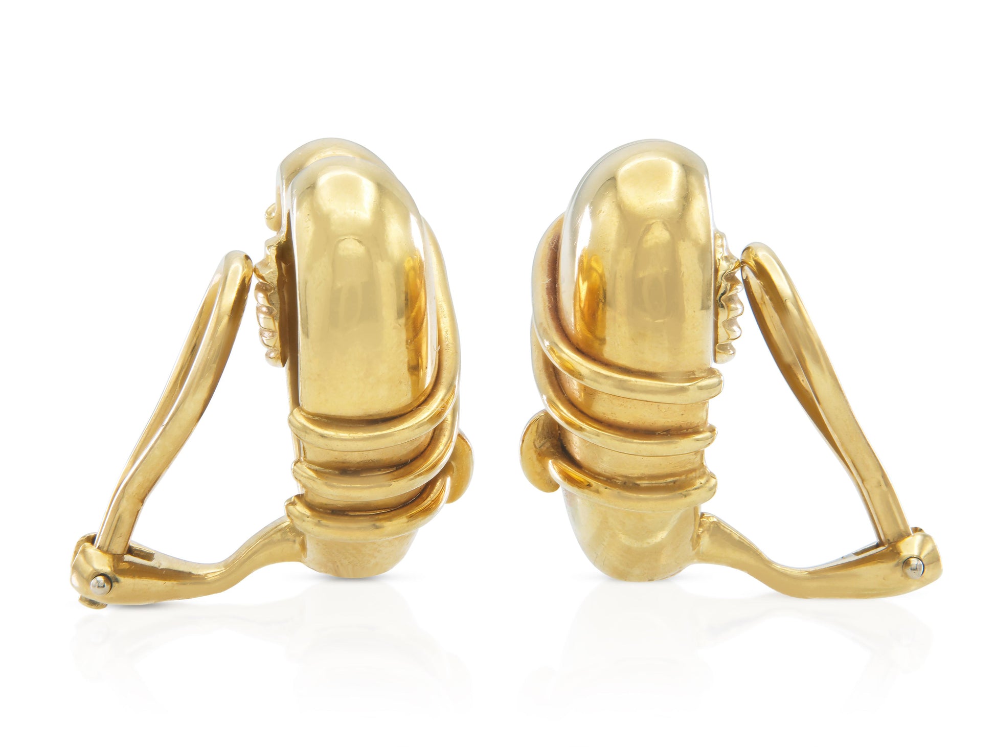 Vintage 1990s Tiffany & Co. Cupid’s Arrow Heart earrings side view with clip-back closures.