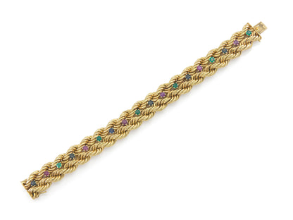 Vintage 1960s Gold Braided Bracelet with Emeralds, Sapphires, and Rubies