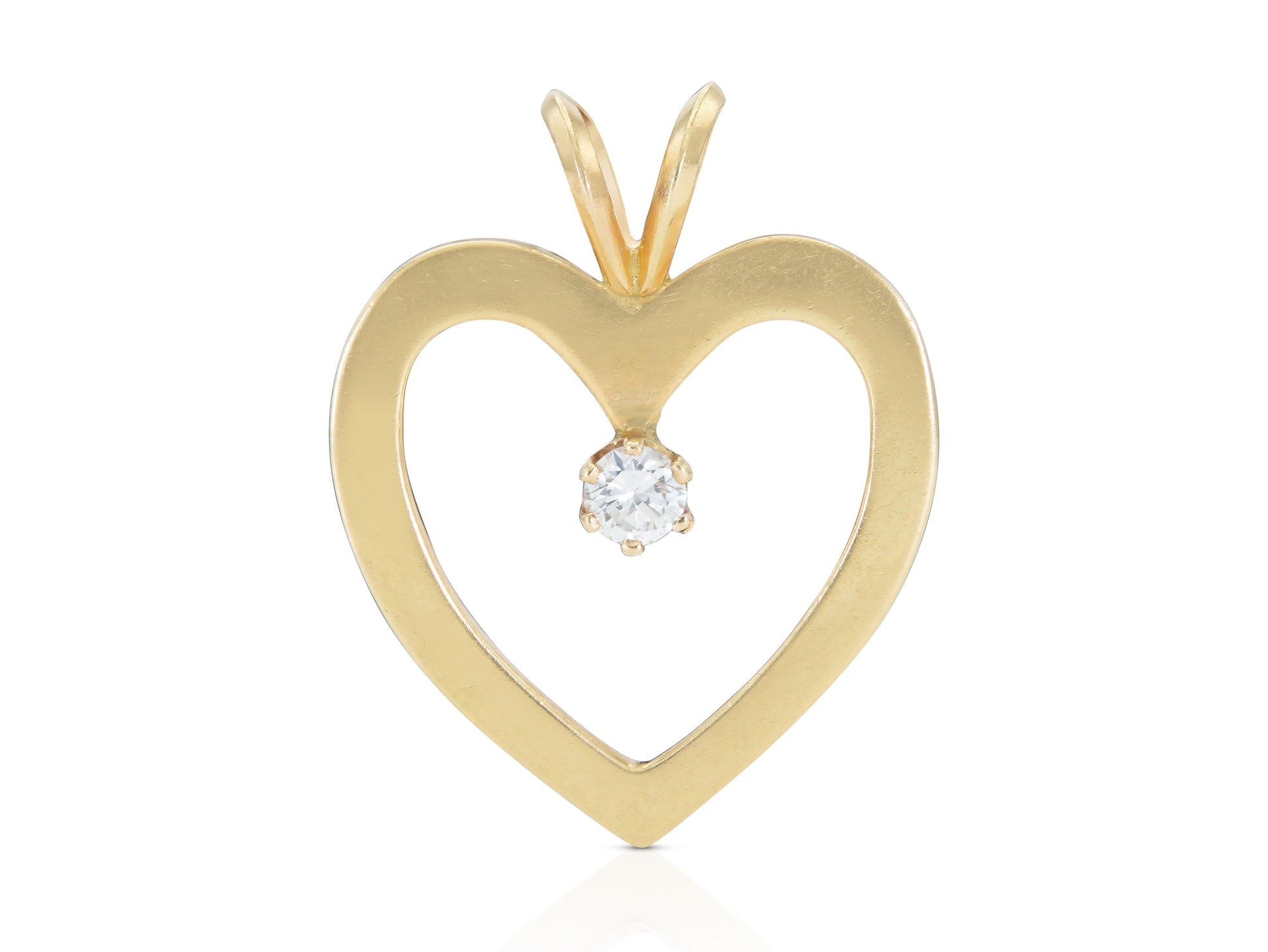 Vintage 1980s Gold Open Heart Pendant with a 0.30 Carat Diamond