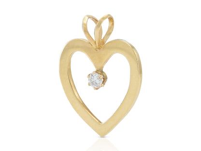 Vintage 1980s Gold Open Heart Pendant with a 0.30 Carat Diamond