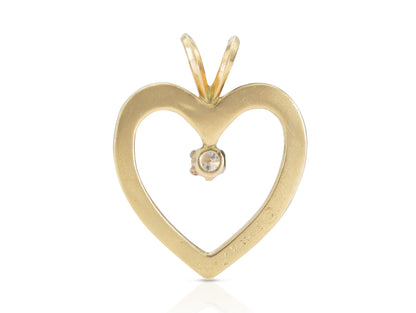 Vintage 1980s Gold Open Heart Pendant with a 0.30 Carat Diamond